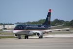 N820MD @ KSRQ - Republic Airlines/US Airways Express Embraer 175 pulls into terminal following arrival at Sarasota-Bradenton International Airport