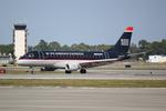 N820MD @ KSRQ - Republic Airlines/US Airways Express Embraer 175 pulls into terminal following arrival at Sarasota-Bradenton International Airport