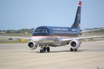N820MD @ KSRQ - Republic Airlines/US Airways Express Embraer 175 pulls into terminal following arrival at Sarasota-Bradenton International Airport