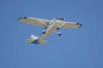 N91310 @ KSRQ - N91310 flies over Sarasota-Bradenton International Airport - by Suncoast Spotter