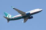 N273AT @ KSRQ - AirTran Boeing 737-700 departs Runway 14 at Sarasota-Bradenton International Airport - by Suncoast Spotter