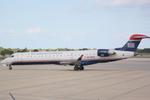 N719PS @ KSRQ - PSA Airlines/US Airways Express CRJ-700 taxis for departure - by Suncoast Spotter