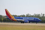 N949WN @ KRSW - Southwest Flight 986 departs Runway 24 at Southwest Florida International Airport enroute to Baltimore-Washington International Airport