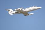 C-GLNL @ KSRQ - Learjet 35A departs Runway 14 at Sarasota-Bradenton International Airport