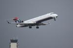 N712PS @ KSRQ - PSA/US Airways Express Flight 2232 departs Runway 14 at Sarasota-Bradenton International Airport enroute to Charlotte/Douglas International Airport - by Suncoast Spotter