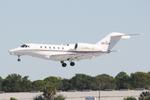 N971QS @ KSRQ - Cessna Citation X arrives on Runway 32 at Sarasota-Bradenton International Airport - by Suncoast Spotter
