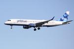 N317JB @ KSRQ - Jet Blue Embraer 190 on approach to Runway 32 at Sarasota-Bradenton International Airport - by Suncoast Spotter