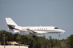 N937QS @ KRSW - NetJets Flight 937 arrives on Runway 6 at Southwest Florida International Airport following flight from Philadelphia International Airport - by Suncoast Spotter