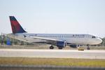 N328NW @ KRSW - Delta Flight 230 taxis for departure from Southwest Florida International Airport prior to a flight to Northern Kentucky International Airport