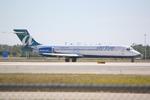 N919AT @ KRSW - AirTran Flight 1412 taxis for departure at Southwest Florida International Airport prior to a flight to Bishops International Airport - by Suncoast Spotter