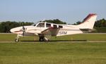 N25RM @ KOSH - Baron 58 zx  - by FloridaMetal