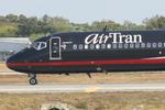 N891AT @ KSRQ - AirTran Flight 696 (Falcons One) arrives on Runway 14 at Sarasota-Bradenton International Airport following a flight from Hartsfield-Jackson Atlanta International Airport - by Suncoast Spotter