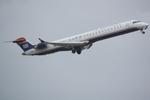 N927LR @ KSRQ - Mesa Airlines/US Airways Express Flight 2646 departs Runway 14 at Sarasota-Bradenton International Airport enroute to Charlotte/Douglas International Airport - by Suncoast Spotter