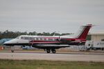 N100RC @ KRSW - Phenom 100RC arrives on Runway 6 at Southwest Florida International Airport following flight from Sioux Falls Regional Airport - by Suncoast Spotter