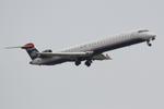 N929LR @ KSRQ - Mesa Airlines/US Airways Express Flight 2647 departs Runway 14 at Sarasota-Bradenton International Airport enroute to Charlotte Douglas International Airport - by Suncoast Spotter