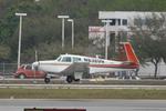 N6320Q @ KSRQ - N6320Q arrives on Runway 32 at Sarasota-Bradenton International Airport