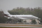 N676QS @ KRSW - NetJets Flight 676 arrives on Runway 6 at Southwest Florida International Airport following flight from Indianapolis Regional Airport - by Suncoast Spotter
