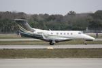 N311FL @ KSRQ - Options Flight 311 taxis for departure at Sarasota-Bradenton International Airport - by Suncoast Spotter