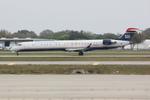 N942LR @ KSRQ - Mesa/US Air Flight 2647 departs Runway 32 at Sarasota-Bradenton International Airport enroute to Charlotte/Douglas International Airport - by Suncoast Spotter