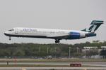 N928AT @ KSRQ - AirTran Flight 696 arrives on Runway 32 at Sarasota-Bradenton International Airport following a flight from Hartsfield-Jackson International Airport - by Suncoast Spotter
