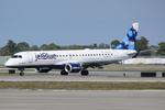 N324JB @ KSRQ - JetBlue Flight 1187 arrives on Runway 14 at Sarasota-Bradenton International Airport following a flight from Boston Logan International Airport - by Suncoast Spotter