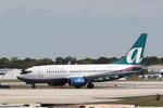 N326AT @ KSRQ - AirTran Flight 696 arrives on Runway 14 at Sarasota-Bradenton International Airport following a flight from Hartsfield-Jackson Atlanta International Airport - by Suncoast Spotter