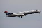 N915FJ @ KSRQ - Mesa/US Airlines Flight 2647 departs Runway 14 at Sarasota-Bradenton International Airport enroute to Sarasota-Bradenton International Airport - by Suncoast Spotter
