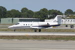 N717AM @ KSRQ - N717AM arrives on Runway 14 at Sarasota-Bradenton International Airport - by Suncoast Spotter