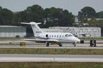 N385PB @ KSRQ - N385PB arrives on Runway 14 at Sarasota-Bradenton International Airport following a flight from Cleveland-Hopkins International Airport - by Suncoast Spotter