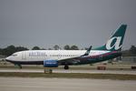 N296AT @ KSRQ - AirTran Flight 696 arrives on Runway 14 at Sarasota-Bradenton International Airport following a flight from Hartsfield-Jackson Atlanta International Airport - by Suncoast Spotter