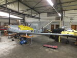 D-EUTO @ EDOI - Bücker Bü 180B Student undergoing maintenance at Bienenfarm airfield (home of part of the collection of Quax, association for the promotion of historic aircraft e.V.), Paulinenaue - by Ingo Warnecke