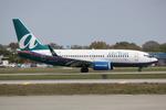 N279AT @ KSRQ - AirTran Flight 696 arrives on Runway 14 at Sarasota-Bradenton International Airport following a flight from Hartsfield-Jackson Atlanta International Airport - by Suncoast Spotter