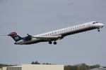 N922FJ @ KSRQ - Mesa/US Air Flight 2647 departs Runway 14 at Sarasota-Bradenton International Airport enroute to Charlotte/Douglas International Airport