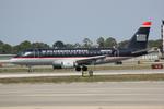 N803MD @ KSRQ - Republic/US Air Flight 3399 arrives on Runway 14 at Sarasota-Bradenton International Airport following a flight from Reagan National Airport - by Suncoast Spotter