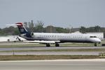 N924FJ @ KSRQ - Mesa/US Flight 2607 arrives on Runway 14 at Sarasota-Bradenton International Airport following a flight from Charlotte/Douglas International Airport