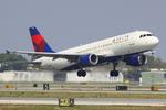 N339NW @ KSRQ - Delta Flight 1146 departs Runway 14 at Sarasota-Bradenton International Airport enroute to Detroit Metro Wayne County International Airport - by Suncoast Spotter