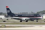 N811MD @ KSRQ - Republic/US Air Flight 3399 arrives on Runway 14 at Sarasota-Bradenton International Airport following a flight from Reagan National Airport
