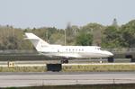 N9867 @ KSRQ - N9867 arrives on Runway 14 at Sarasota-Bradenton International Airport - by Suncoast Spotter