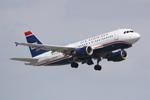 N770UW @ KSRQ - US Air Flight 1578 departs Runway 14 at Sarasota-Bradenton International Airport enroute to Charlotte-Douglas International Airport - by Suncoast Spotter