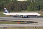 N163US @ KTPA - US Air Flight 976 departs Runway 1L at Tampa International Airport enroute to Charlotte-Douglas International Airport - by Suncoast Spotter