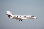 N388QS @ KRSW - NetJets Flight 388 arrives on Runway 6 at Southwest Florida International Airport following flight from Punta Gorda Airport - by Suncoast Spotter