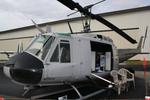 N911BV @ KPGD - Bell UH-1 Iroquois on display at Florida International Air Show