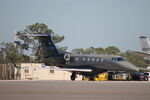 N82161 @ KRSW - Phenom 82161 sits on the Private Sky ramp at Southwest Florida International Airport - by Suncoast Spotter