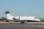N309WB @ KRSW - Challenger 309WB sits on the Private Sky ramp at Southwest Florida International Airport - by Suncoast Spotter