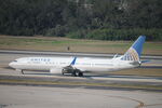 N62892 @ KTPA - United Flight 1979 taxis to gate at Tampa International Airport following flight from Newark-Liberty International Airport - by Suncoast Spotter