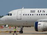 N733UW @ KSRQ - US Air Flight 1860 prepares for departure from Sarasota-Bradenton International Airport - by Suncoast Spotter