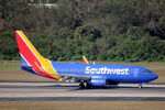 N7736A @ KTPA - Southwest Flight 1143 arrives on Runway 1L at Tampa International Airport following flight from Reagan National Airport - by Suncoast Spotter