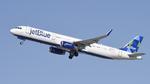 N987JT @ KLAX - Departing LAX on 25R - by ToddRoyer