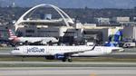 N986JB @ KLAX - Arriving at LAX on 25L - by ToddRoyer