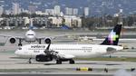 N986JB @ KLAX - Arriving at LAX on 25L - by ToddRoyer